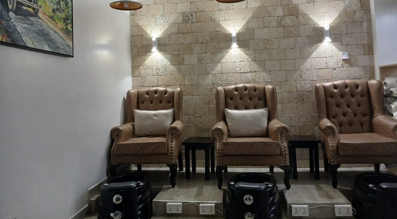 Comfortable pedicure chairs in Carys Salon, Barber and SPA, Nairobi, Nairobi County, KE, creating a chic atmosphere.