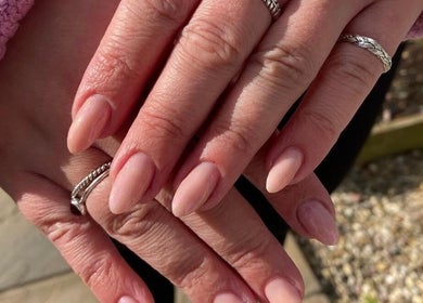 Beautiful manicured hands at Soph Does Nails in Yate, England, GB showcasing elegant nail design.
