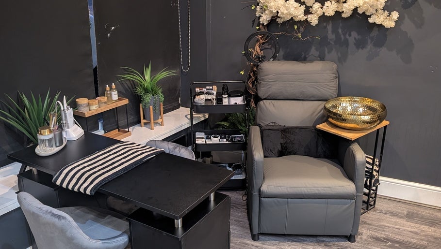 Cozy salon corner at Beauty by Blue in Farsley, England, GB with plush chair, decor, and beauty tools.