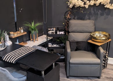 Cozy salon corner at Beauty by Blue in Farsley, England, GB with plush chair, decor, and beauty tools.
