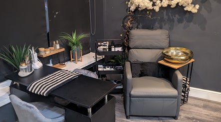 Cozy salon corner at Beauty by Blue in Farsley, England, GB with plush chair, decor, and beauty tools.