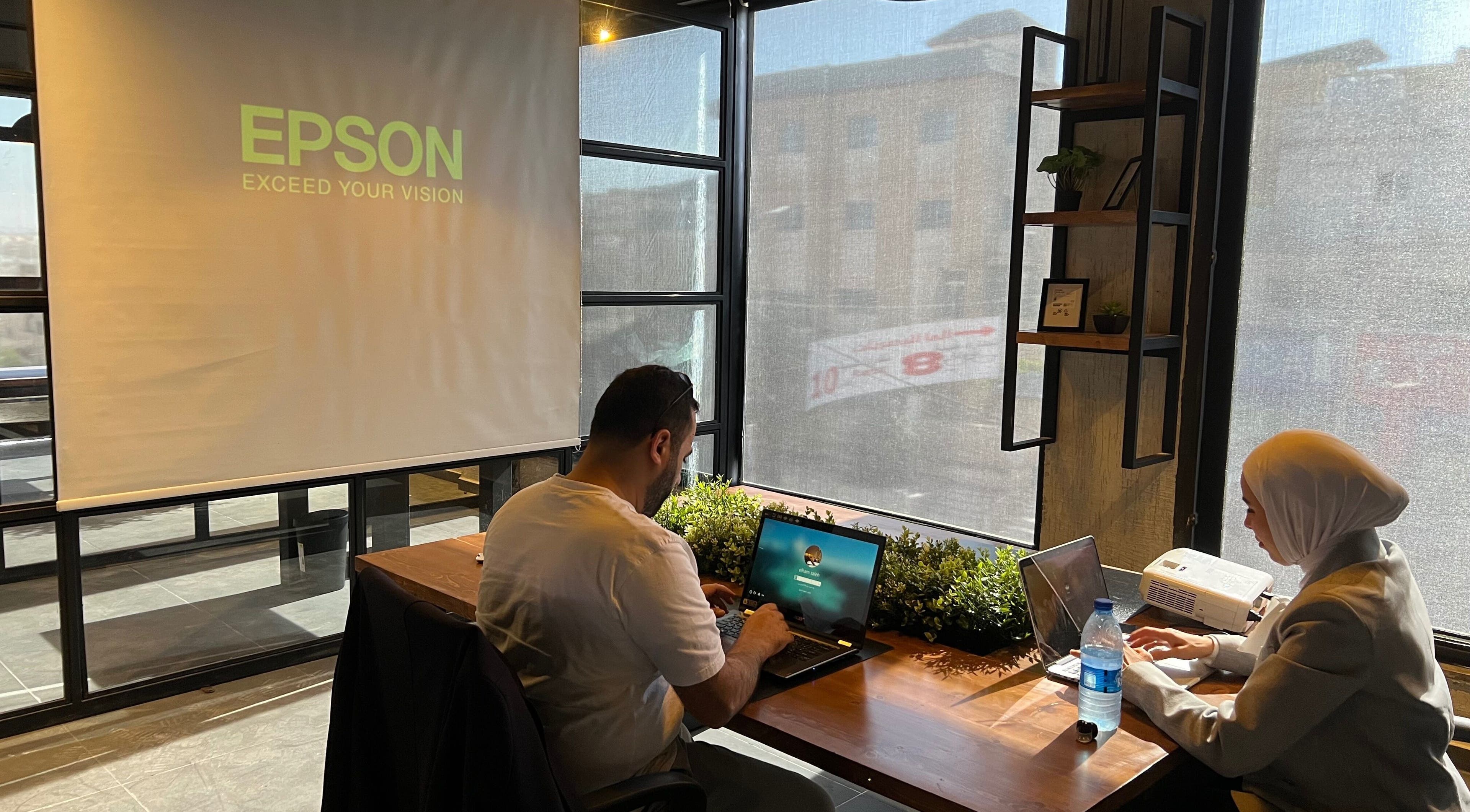 People working in a modern office at Spaces offices, Az-zarqa, Zarqa Governorate, JO with natural light.