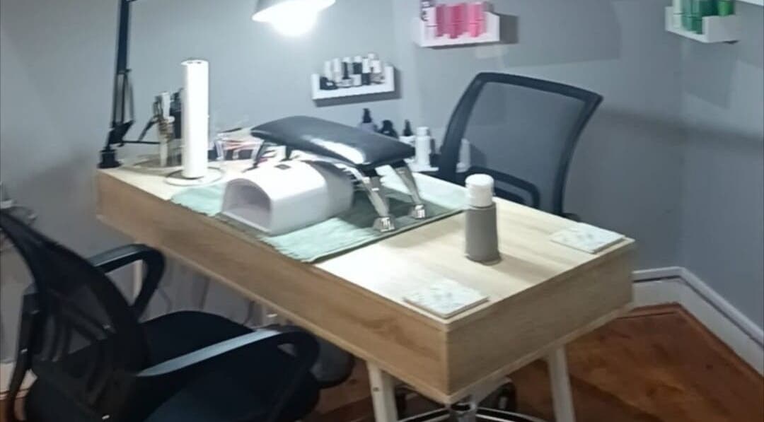Nail table setup at Lanie's Touch, Benoni, Gauteng, ZA, featuring tools and a comfortable chair.