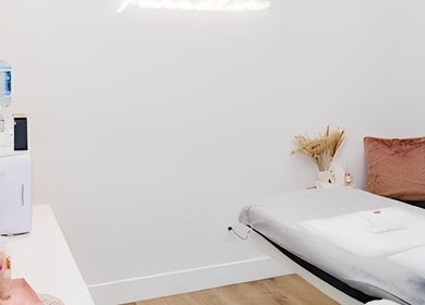 Peaceful therapy room at The OG Brazilianaire Studio, Spanish Fork, Utah, US with a cozy massage bed.