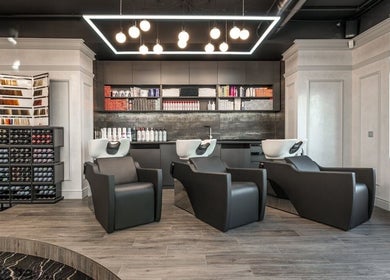 Modern hair washing area at EZEE Beauty Pty Ltd, Hendra, Queensland, AU with sleek salon chairs and stylish decor.