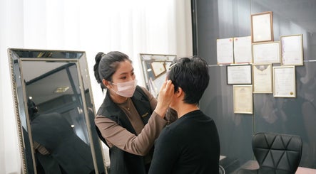 Beauty by Maggie professional makeup session at Sunnybank Hills QLD, Queensland, AU with certification wall.