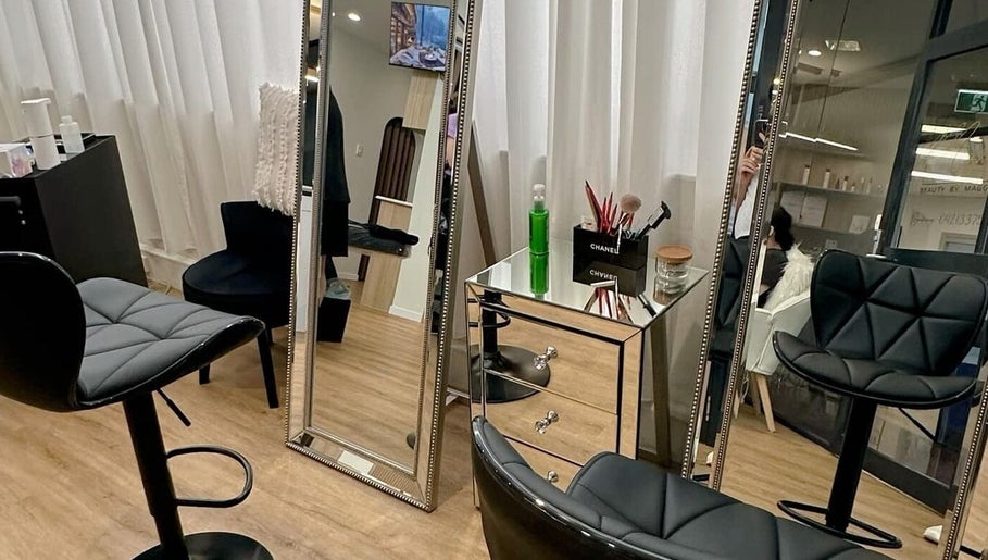 Modern salon interior at Beauty by Maggie, Sunnybank Hills QLD, Queensland, AU with elegant mirrors and chairs.