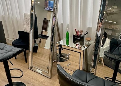 Modern salon interior at Beauty by Maggie, Sunnybank Hills QLD, Queensland, AU with elegant mirrors and chairs.