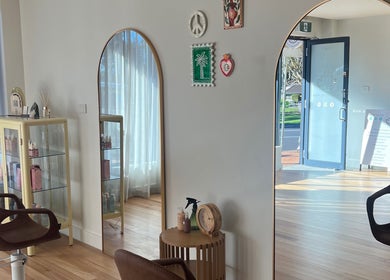 Interior of Spiritual Soul Hair Co - Gerringong, showcasing modern salon chairs and decor in Gerringong, New South Wales, AU.