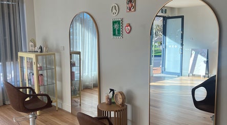Interior of Spiritual Soul Hair Co - Gerringong, showcasing modern salon chairs and decor in Gerringong, New South Wales, AU.
