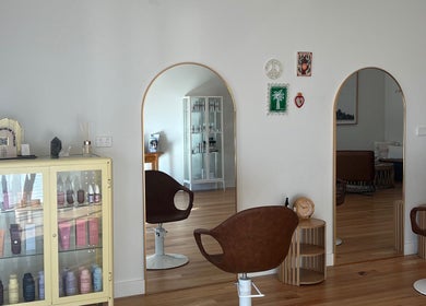 Sleek salon interior at Spiritual Soul Hair Co - Gerringong in Gerringong, New South Wales, AU with modern decor.