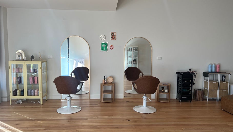 Elegant salon setup at Spiritual Soul Hair Co - Gerringong, New South Wales, AU with chairs and mirrors.
