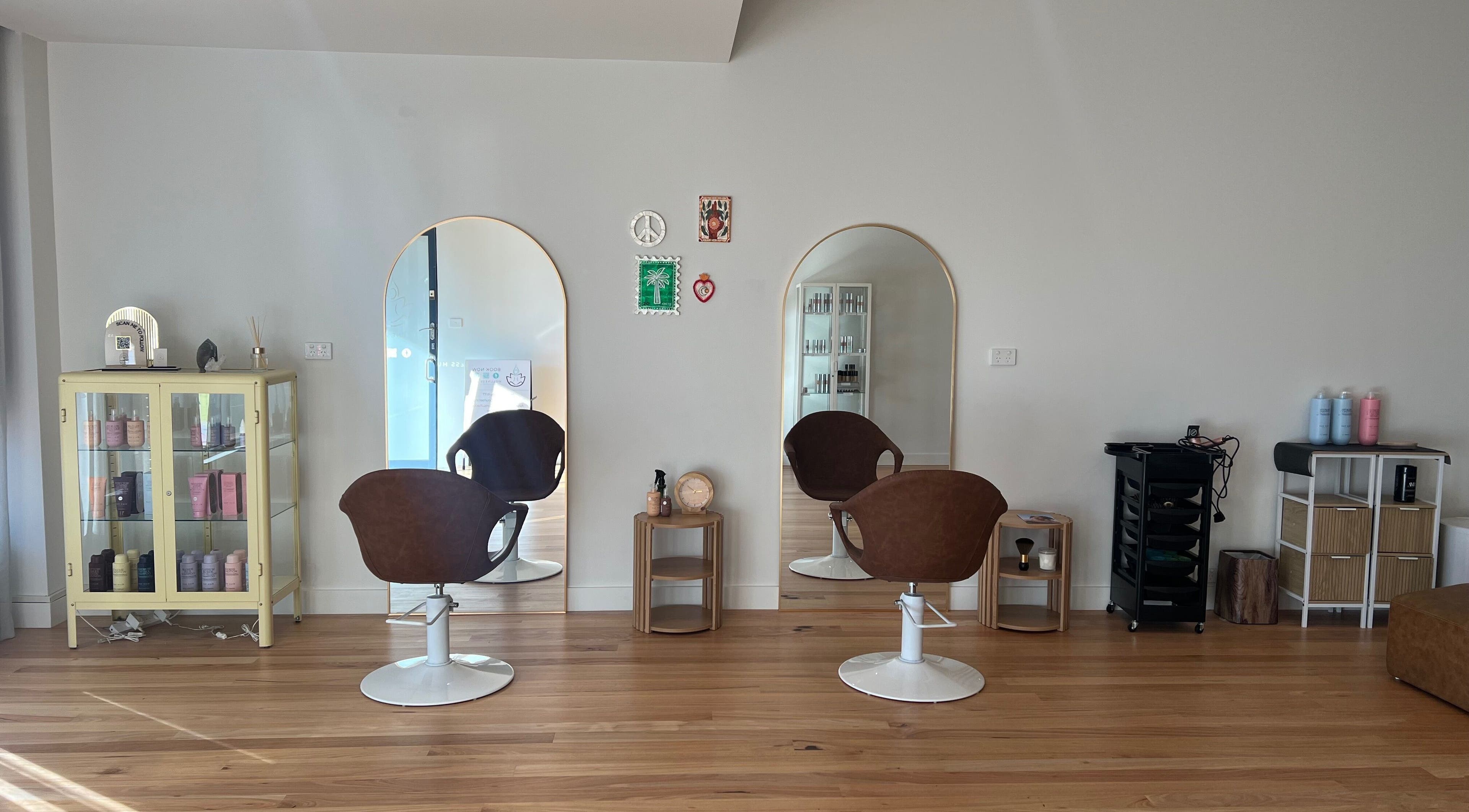 Elegant salon setup at Spiritual Soul Hair Co - Gerringong, New South Wales, AU with chairs and mirrors.