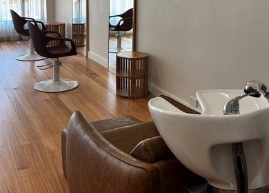 Elegant interior of Spiritual Soul Hair Co - Gerringong, showcasing styling chairs and wash station in Gerringong, NSW.