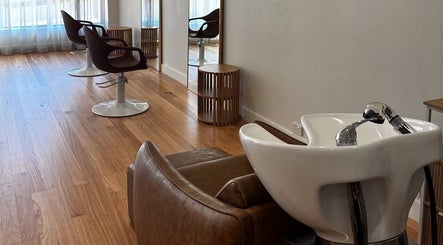 Elegant interior of Spiritual Soul Hair Co - Gerringong, showcasing styling chairs and wash station in Gerringong, NSW.