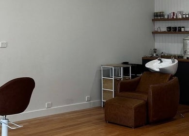 Modern salon interior with brown chair at Spiritual Soul Hair Co - Gerringong, New South Wales, AU.