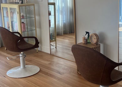 Brown salon chairs and mirror at Spiritual Soul Hair Co - Gerringong, Gerringong, New South Wales, AU.