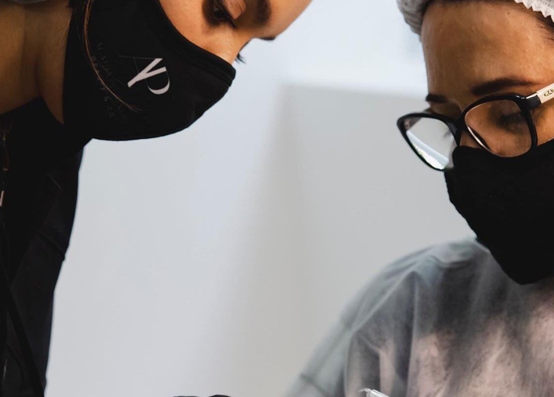 Professionals at Studio Ap & Co in Neutral Bay, New South Wales, AU, engaged in detailed beauty work.