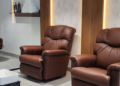 Luxurious leather recliners at The Good Man spa, Dubai, Dubai, AE, offering ultimate relaxation and comfort.