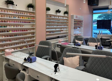 UME Nails and Beauty in Manning, WA offers a vibrant array of nail polishes in a stylish, modern salon setting.