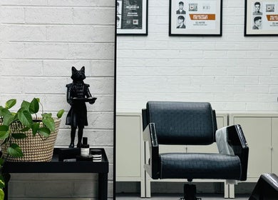 Chic salon chair and decor at Ash Bang in Melbourne, Victoria, AU, showcasing stylish design and elegance.