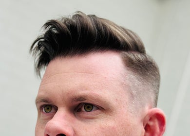 Close-up of a trendy fade haircut at Ash Bang, Melbourne, Victoria, AU.