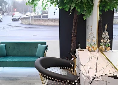 Elegant interior of Reflection Hair and Beauty Norwich, showcasing stylish seating in Norwich, England, GB.