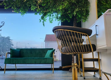 Chic interior of Reflection Hair and Beauty Norwich, featuring elegant seating in Norwich, England, GB.