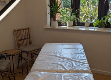 Tranquil treatment room at Microbladed by Rachel in Costessey, England, GB, featuring a cozy massage table.