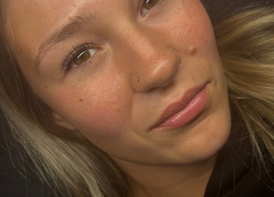 Close-up of a woman's face showcasing natural beauty at Sculpted by Sylvie in Gainsborough, England, GB.