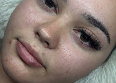 Close-up of a client's face with detailed lashes at Sculpted by Sylvie, Gainsborough, England, GB.