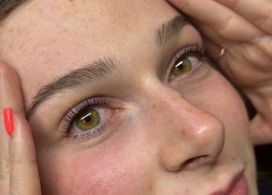 Close-up of a woman's radiant skin and natural makeup at Sculpted by Sylvie, Gainsborough, England, GB.