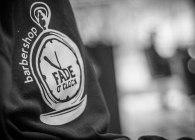 Fade O Clock barbershop logo on a black shirt in Dublin, County Dublin, IE.
