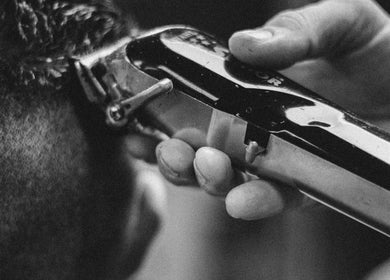 Close-up of a clipper trimming hair at Fade O Clock in Dublin, County Dublin, IE.