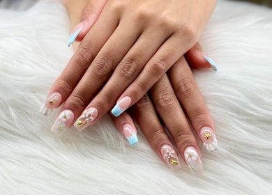 Intricate nail designs at Ten Perfect Nail Design in Lowell, Massachusetts, US.