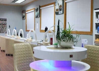 Chic interior of Ten Perfect Nail Design in Lowell, Massachusetts, US, featuring elegant nail stations.