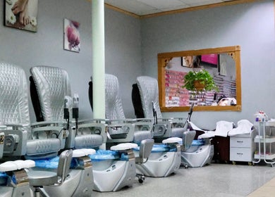 Relaxing pedicure chairs at Ten Perfect Nail Design in Lowell, Massachusetts, US, offering a serene experience.