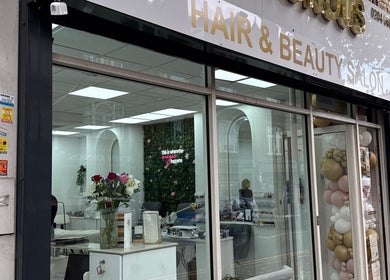 Front view of Angel Glow by Vesi in London, GB, showcasing a modern beauty salon exterior.