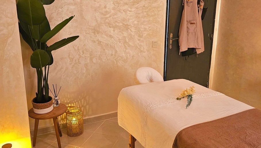 Tranquil massage room at Wabi Sabi Massage Tangier, Tanger, Tanger-tétouan-al Hoceima, MA, with warm decor.