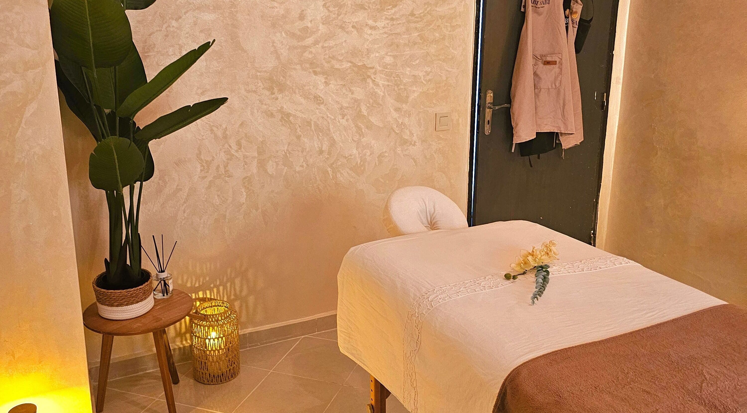 Tranquil massage room at Wabi Sabi Massage Tangier, Tanger, Tanger-tétouan-al Hoceima, MA, with warm decor.