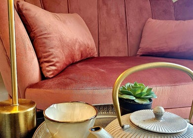 Luxurious seating with a teapot and succulents at Wabi Sabi Massage Tangier, Tanger, Tanger-tétouan-al Hoceima, MA.