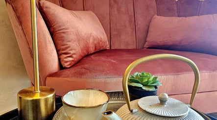 Luxurious seating with a teapot and succulents at Wabi Sabi Massage Tangier, Tanger, Tanger-tétouan-al Hoceima, MA.