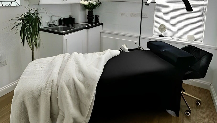Massage room at Relax with Me Body Massage, Columbia, South Carolina, US, with cozy blankets and tranquil decor.