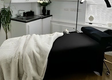 Massage room at Relax with Me Body Massage, Columbia, South Carolina, US, with cozy blankets and tranquil decor.