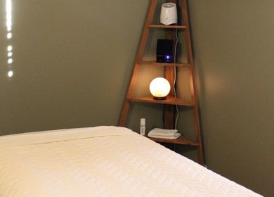 Peaceful massage room at Relax with Me Body Massage, Columbia, South Carolina, US with warm lighting.
