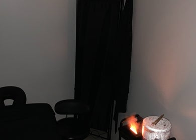 Relaxing treatment room at Studio Delights in Nassau, New Providence, BS, featuring massage and spa essentials.