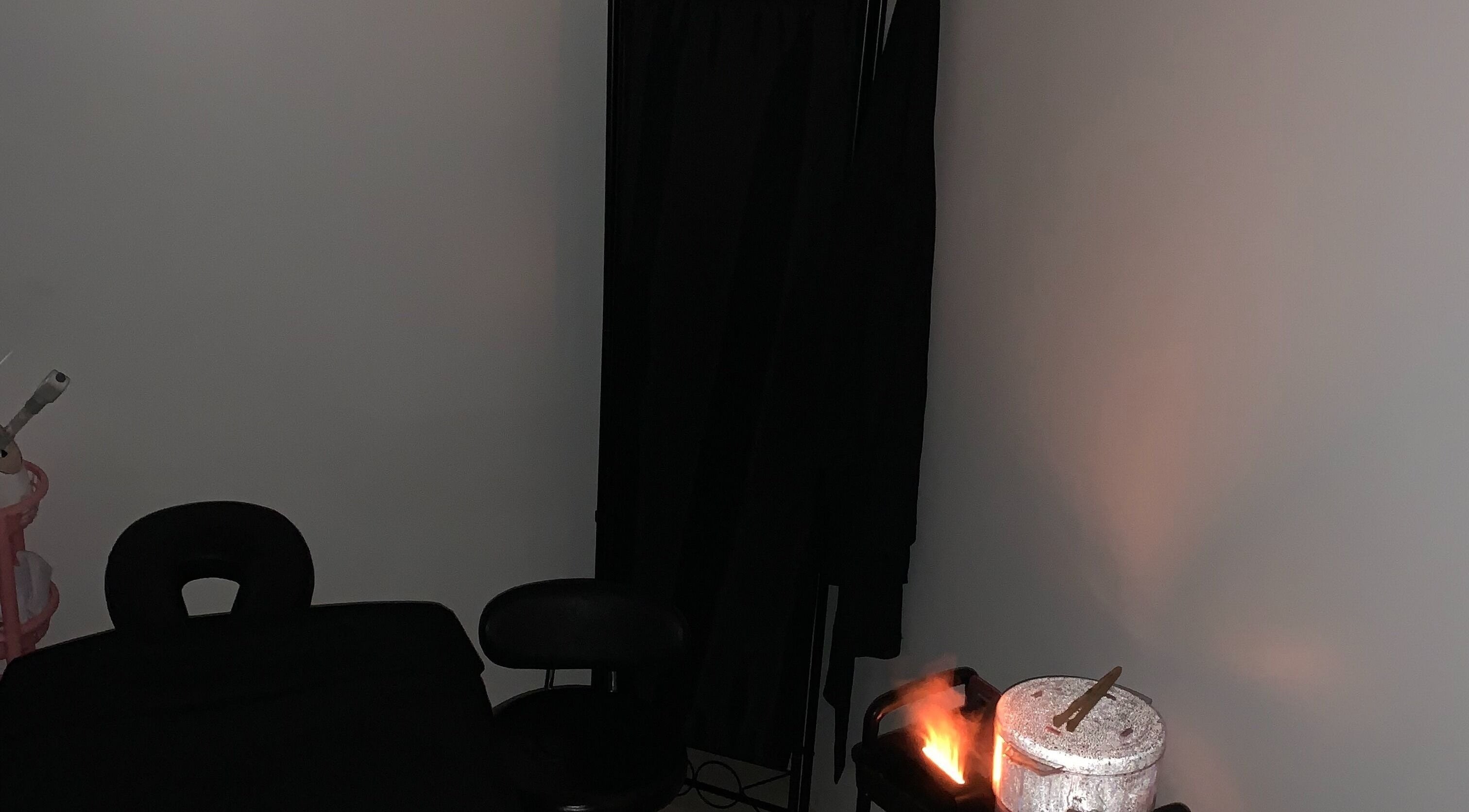 Relaxing treatment room at Studio Delights in Nassau, New Providence, BS, featuring massage and spa essentials.