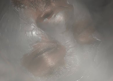 Relaxing facial treatment at Studio Delights, Nassau, New Providence, BS, enveloped in soothing mist.