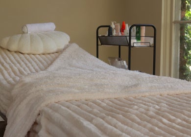 Luxurious spa bed setup at Young Aesthetic Solutions in Melbourne, Victoria, AU.