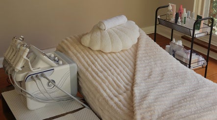 Relaxing treatment room at Young Aesthetic Solutions, Melbourne, Victoria, AU with soft linens and beauty equipment.